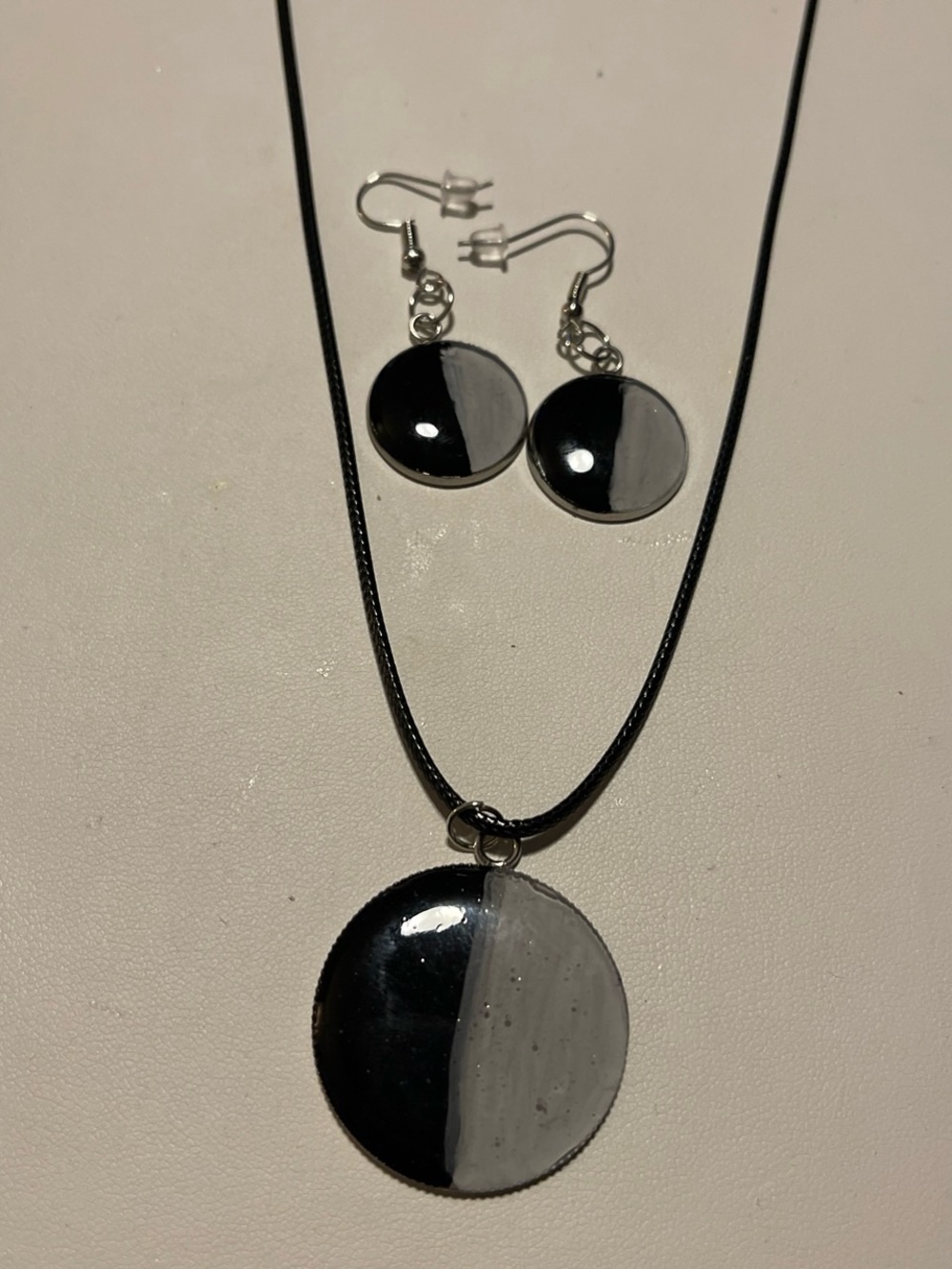Two-Tone Black and Gray Round Pendant Necklace with Matching Earrings